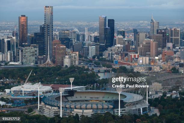 An aerial view of Rod Laver Arena and the Melbourne Cricket Ground with the Melbourne city skyline on February 13, 2018 in Melbourne, Australia.