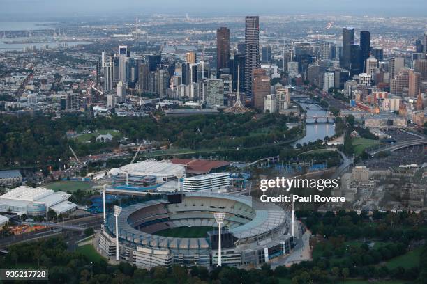 An aerial view of Hisense Arena, Rod Laver Arena and the Melbourne Cricket Ground with the Melbourne city skyline on February 13, 2018 in Melbourne,...