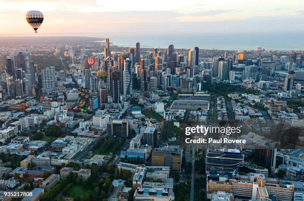 An aerial view of hot air balloons flying above the Melbourne city skyline on February 13, 2018 in Melbourne, Australia.