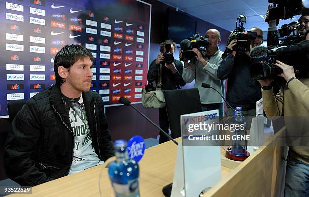 Barcelona's Argentinian forward Lionel Messi arrives at a press conference at the Ciutat esportiva Joan Gamper near Barcelona on December 1, 2009....