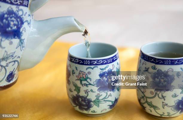 chinese tea being poured - 中国茶 ストックフォトと画像