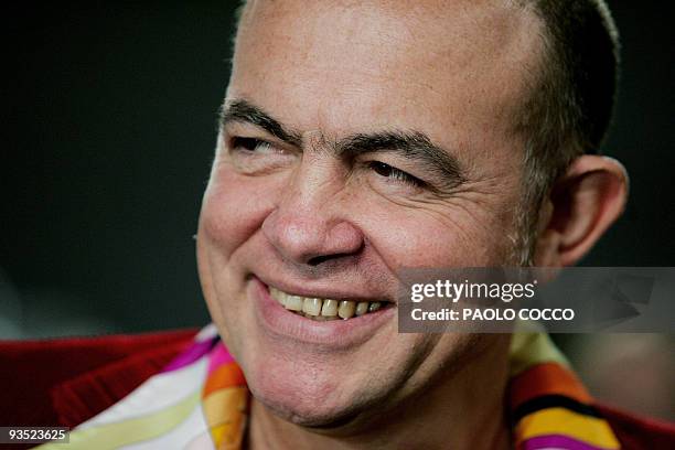 French designer Christian Lacroix smiles at the end of Emilio Pucci's Spring/Summer 2005 women's collection at Milan's fashion week 28 September...