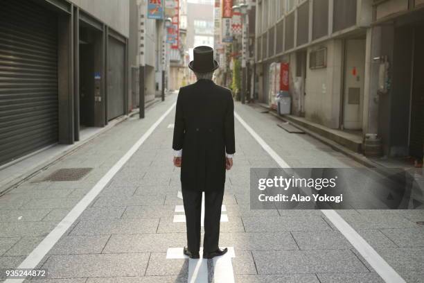 a man is in the city - actor japan ストックフォトと画像