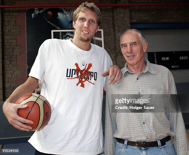 Dirk Nowitzki and personal coach Holger Geschwindner pose at a training camp on September 28, 2006 in Wuerzburg, Germany.