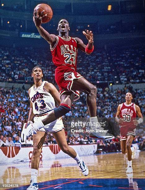 Playoffs: Chicago Bulls Michael Jordan in action vs Cleveland Cavaliers Brad Daugherty . Game 4. Richfield, OH 5/5/1988 CREDIT: John Biever