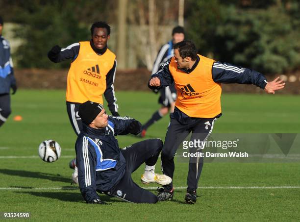 Michael Ballack and Ricardo Carvalho of Chelsea during a training session at the Training ground on December 1, 2009 in Cobham, England.