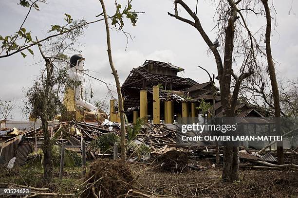 This picture taken on May 16, 2008 shows a monastry destoyed by cyclone Nargis near Kyauktan in the delta region south of Yangon. State television on...