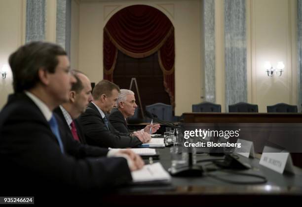 Rick Schostek, executive vice president of Honda North America Inc., right, speaks during a Senate Commerce Committee hearing on National Highway...