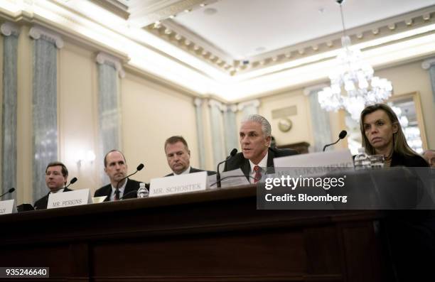 Rick Schostek, executive vice president of Honda North America Inc., second right, speaks during a Senate Commerce Committee hearing on National...