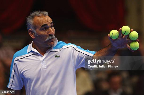 Mansour Bahrami of Iran enjoys his doubles match with Jeremy Bates of Great Britain against Peter McNamara and Mark Woodforde of Australia during day...