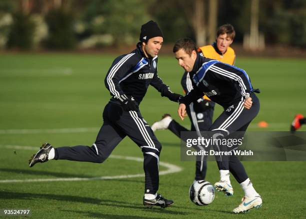 Deco and Joe Cole of Chelsea during a training session at their training ground on December 1, 2009 in Cobham, England.