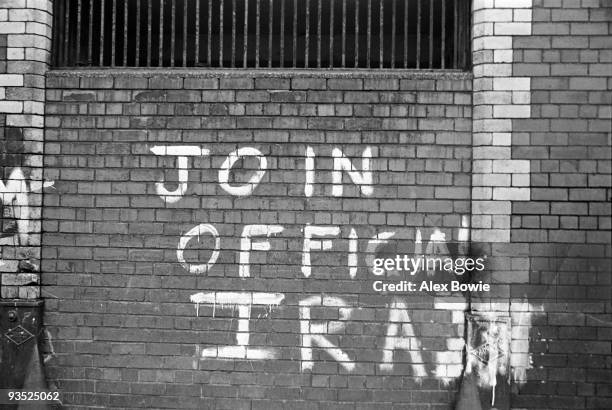 Graffiti in the Republican Ardoyne district of north Belfast, reading 'Join official IRA', 19th April 1976.