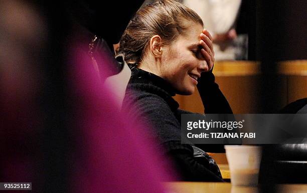 Student Amanda Knox, accused of taking part in the killing of her British roommate Meredith Kercher, arrives for a trial session on December 1, 2009...