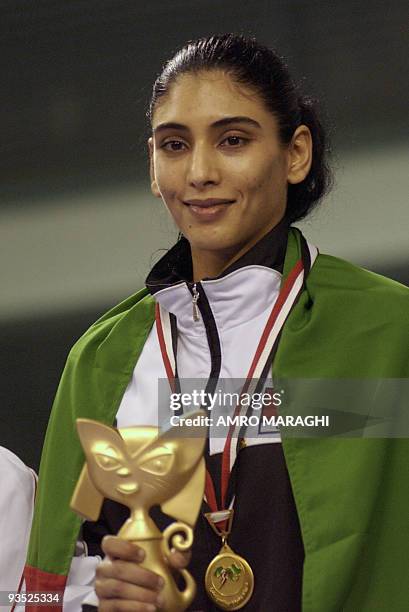 Emirati Maithaa al-Maktoum, the daughter of the ruler of Dubai Sheikh Mohammed bin Rashed al-Maktoum, poses on the podium after she won the gold...