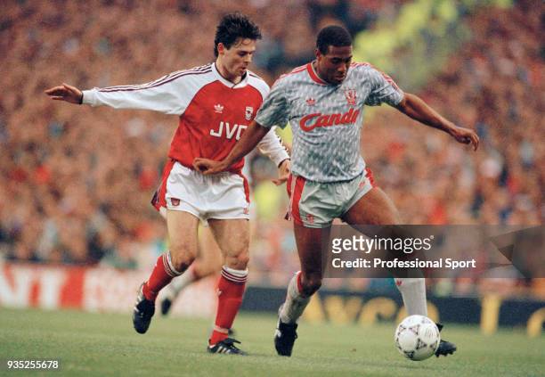 Anders Limpar of Arsenal closes down John Barnes of Liverpool during a Barclays League Division One match at Highbury on December 2, 1990 in London,...