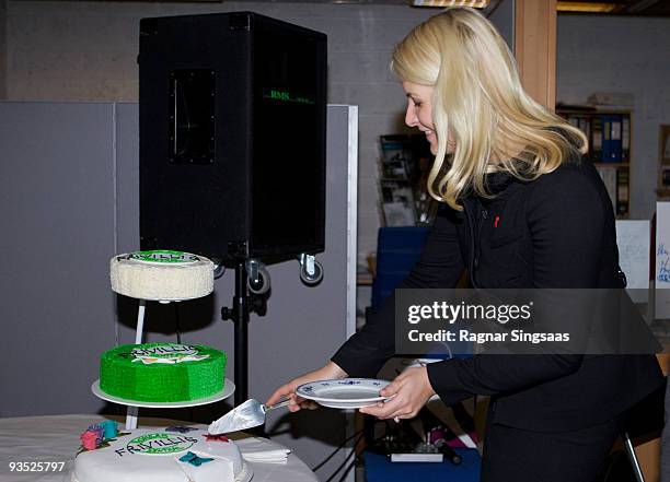 Crown Princess Mette-Marit of Norway attends the World Aids Day event at Romsas Frivillighetssentral on December 1, 2009 in Oslo, Norway.