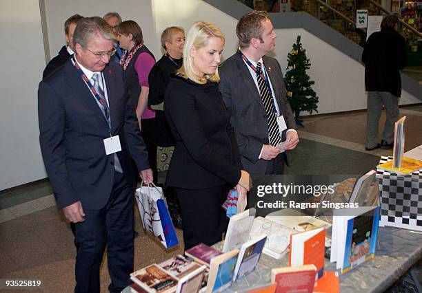 Fabian Stang the mayor of Oslo and Crown Princess Mette-Marit of Norway attend the World Aids Day event at Romsas Frivillighetssentral on December 1,...