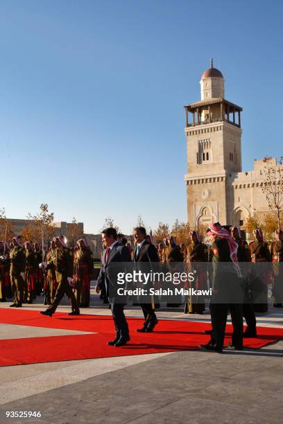 Turkish President Abdullah Gul and his wife Hayrunnisa Gul are received by Jordan's King Abdullah and his wife Queen Rania upon their arrival for a...