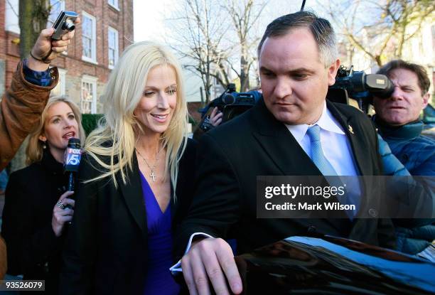 Michaele and Tareq Salahi leave the Halcyon House in Georgetown on December 1, 2009 in Washington, DC. The couple are under investigation for...