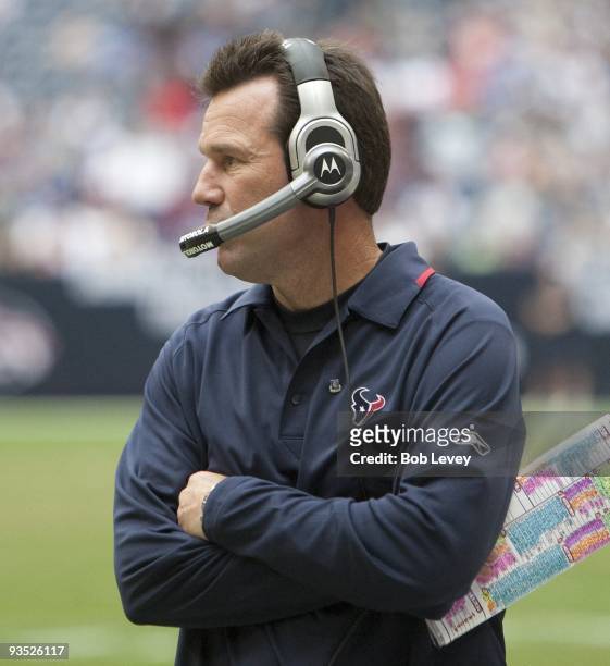 Head coach Gary Kubiak of the Houston Texans checks the scoreboard at Reliant Stadium during their game against the Indianapolis Colts on November...