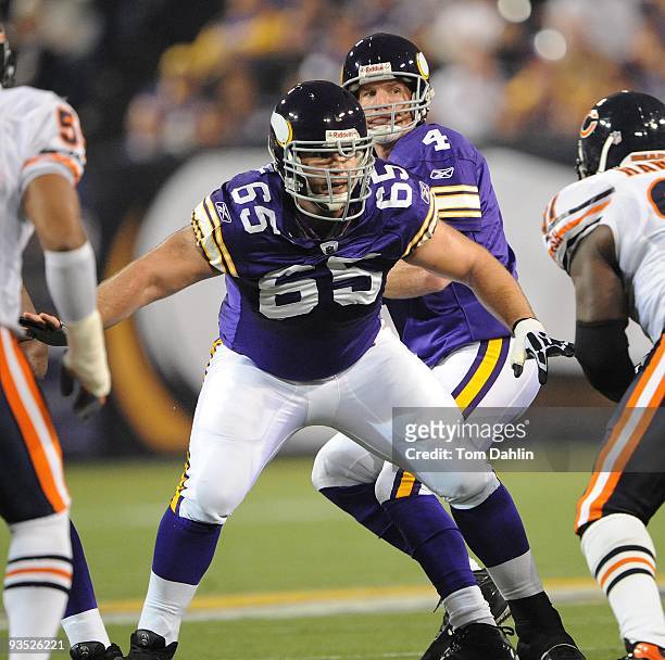 John Sullivan of the Minnesota Vikings pass blocks during an NFL game against the Chicago Bears at the Mall of America Field at Hubert H. Humphrey...
