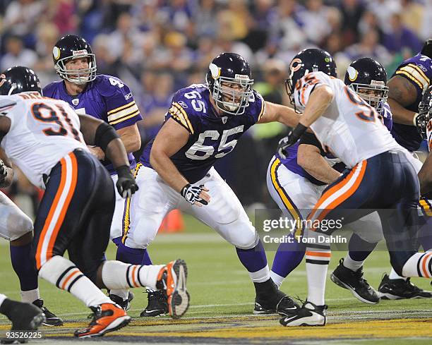 John Sullivan of the Minnesota Vikings pass blocks during an NFL game against the Chicago Bears at the Mall of America Field at Hubert H. Humphrey...