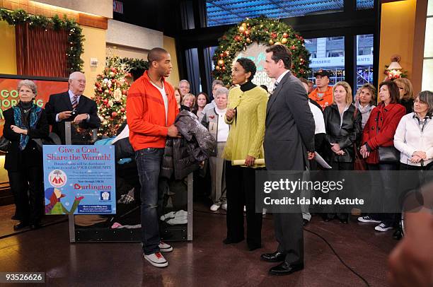 Soccer star Oguchi Onyewu stops by Times Square to donate to the "Warm Coats & Warm Hearts" holiday coat drive, on GOOD MORNING AMERICA, 12/1/09...