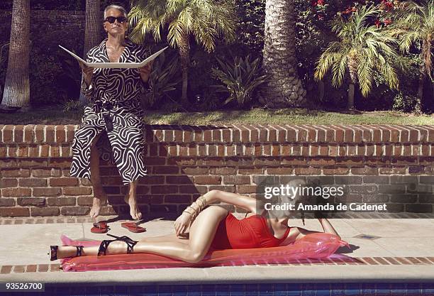 Actor and Actress Amber Heard and George Hamilton are photographed for Harper's Bazaar. PUBLISHED IMAGE.