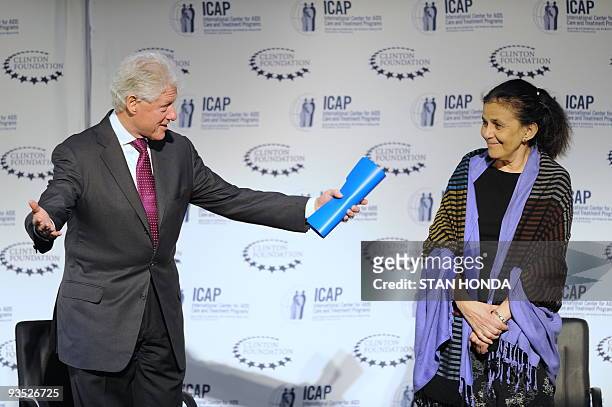 Former US President Bill Clinton participates in a panel discussion on World AIDS Day hosted by the Clinton Foundation and the International Center...