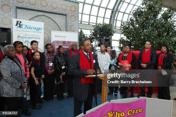 Walter Jones, Founder and CEO of Fathers Who Cares participates in the press conference at Garfield Park Conservatory to raise awareness of AIDS in...