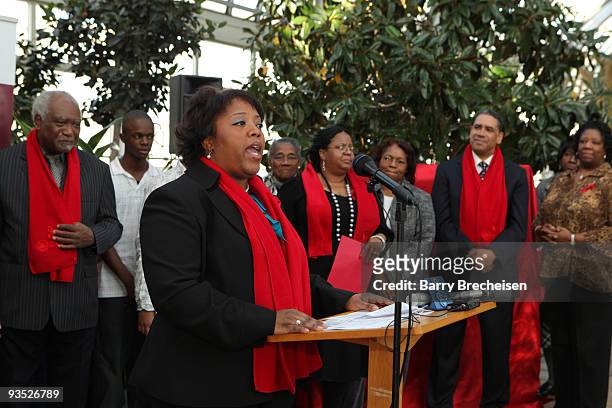 Illinois Lottery's Tracy Manuel participates in the press conference at Garfield Park Conservatory to raise awareness of AIDS in Africa on World AIDS...