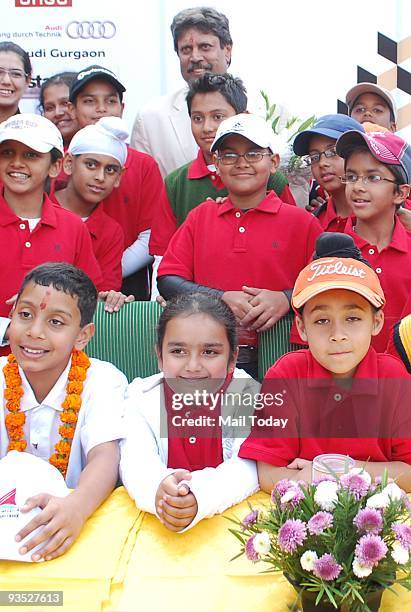 Kapil Dev with the participants at a press meet to launch the junior Golf tournament at Classic Golf course on Tuesday, November 24, 2009.