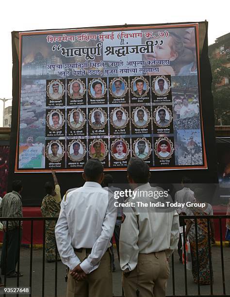 People pay homage to the victims of November 26 terror attacks on its first anniversary in Mumbai.