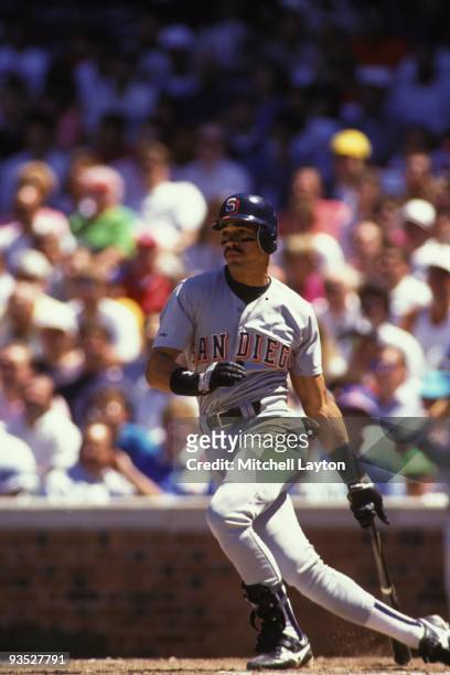 Benito Santiago of the San Diego Padres takes a swing during a baseball game against the Chicago Cubs on June 4, 1991 at Wrigley Field in Chicago,...