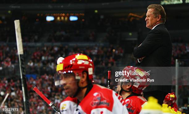 Head coach Hans Zach of Scorpions looks on during the Deutsche Eishockey Liga game between Koelner Haie and Hannover Scorpions at Lanxess Arena on...