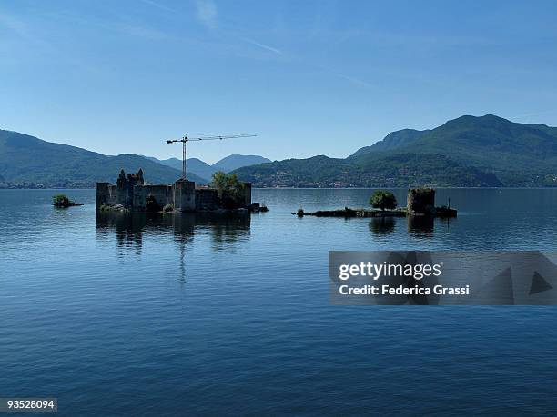 work in progress at the cannero castles - cranes castle stock pictures, royalty-free photos & images
