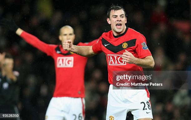 Darron Gibson of Manchester United celebrates scoring their first goal during the Carling Cup Quarter Final match between Manchester United and...