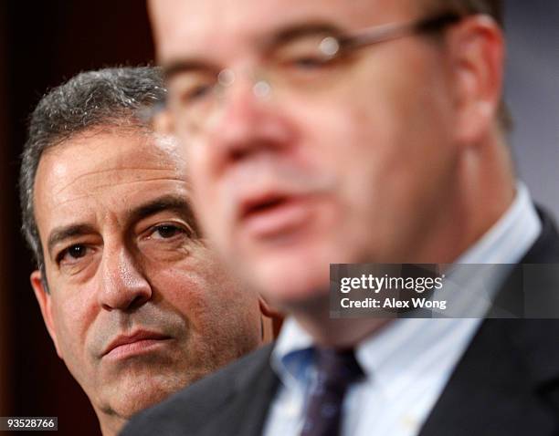 Rep. James McGovern speaks as Sen. Russell Feingold listens during a news conference on Capitol Hill December 1, 2009 in Washington, DC. The...
