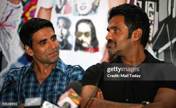 Bollywood actors Akshay Kumar and Suniel Shetty during a promotional event for their upcoming film De Dana Dan in New delhi on monday evening.