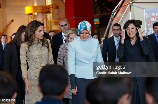 Queen Rania of Jordan and the Turkish President's wife Hayrunnisa Gul visit the Children's Museum on December 1, 2009 in Amman, Jordan.