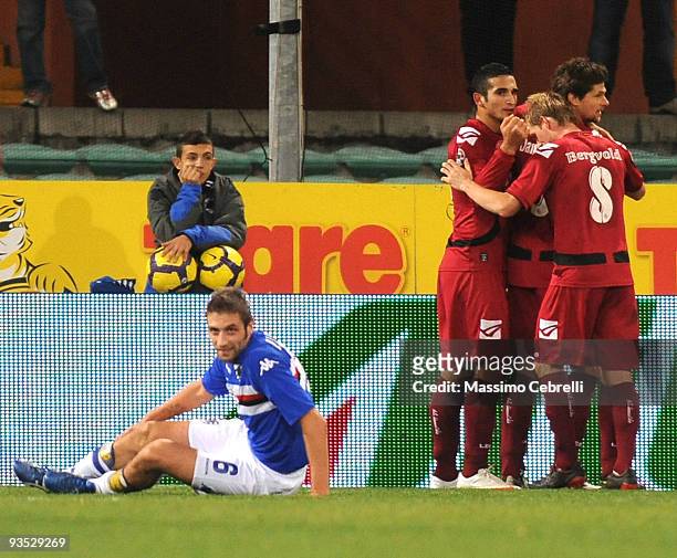 Tomas Danilevicius of AS Livorno celebrates after scoring his team's first goal with team mates during the TIM Cup match between UC Sampdoria and AS...