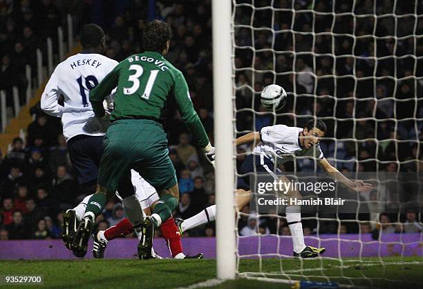 Stewart Downing of Aston Villa scores his team's third goal during the Carling Cup quarter final match between Portsmouth and Aston Villa at Fratton...