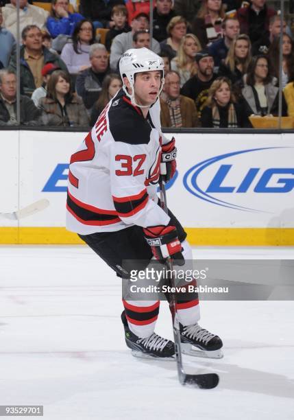 Matthew Corrente of the New Jersey Devils skates with the puck against the Boston Bruins at the TD Garden on November 27, 2009 in Boston,...