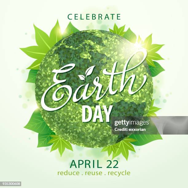earth day green globe - grass clipping path stock illustrations