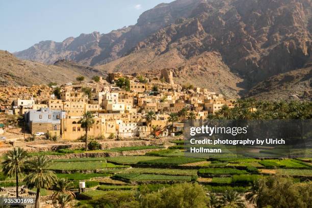 the picturesque village of balad sayt, al-hajar mountain, oman - desert mountain range stock pictures, royalty-free photos & images