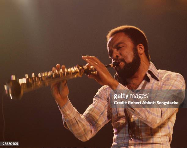 American jazz saxophonist Grover Washington, Jr. , playing a soprano saxophone at an unidentified venue, 1978.