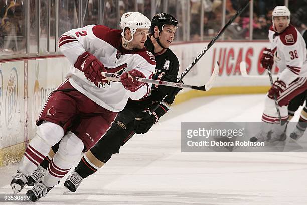 Jim Vandermeer of the Phoenix Coyotes battles for position against Ryan Getzlaf of the Anaheim Ducks during the game on November 29, 2009 at Honda...