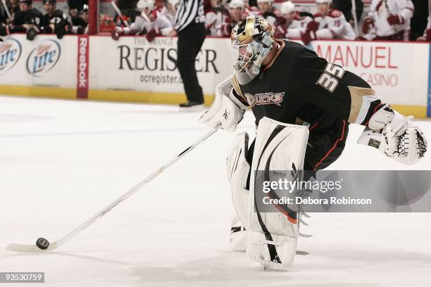 Jean-Sebastien Giguere of the Anaheim Ducks clears the puck from crease during the game against the Phoenix Coyotes on November 29, 2009 at Honda...