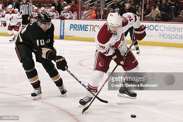 Petr Prucha of the Phoenix Coyotes battles for the puck against Corey Perry of the Anaheim Ducks during the game on November 29, 2009 at Honda Center...