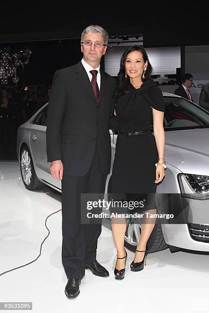 Rupert Stadler and Lucy Liu attend 'The Art of Progress' World-premiere of the new Audi A8 at the Audi Pavilion on November 30, 2009 in Miami,...